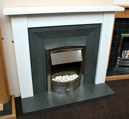 Grey slate splayed fireplace