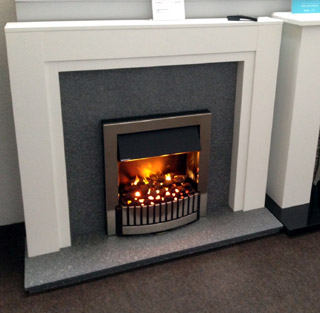 White fire surround with granite