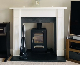 White fire surround for stove