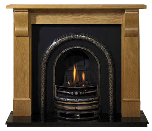Cast iron fireplace insert with solid oak fire surround Cast iron fireplace inserts